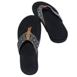 Reef Ortho Heel Flip Flops with black and white woven straps, Women’s Size 7